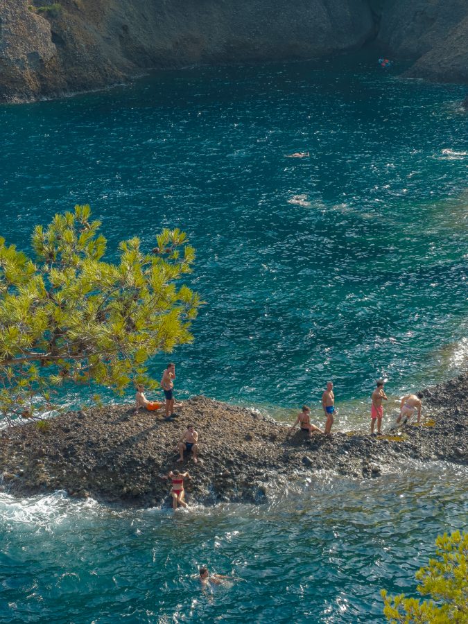 Deep blue water, hard noon light — edited with Neutra