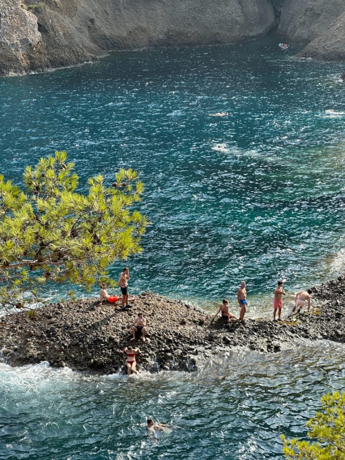 Deep blue water, hard noon light — untouched RAW